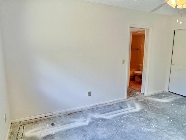 2391 Sumatran Way Unit 37, Clearwater, FL 33763 - spare room with baseboards and a ceiling fan