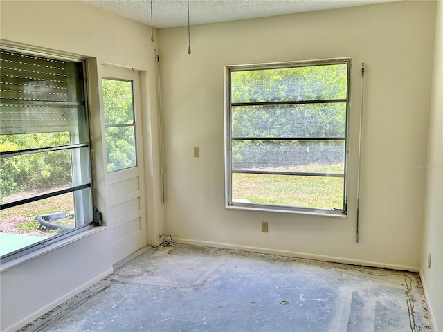 2391 Sumatran Way Unit 37, Clearwater, FL 33763 - spare room with baseboards