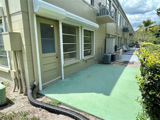 2391 Sumatran Way Unit 37, Clearwater, FL 33763 - view of patio / terrace with central air condition unit