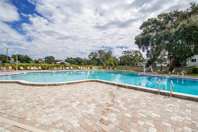 2391 Sumatran Way Unit 37, Clearwater, FL 33763 - community pool with a patio