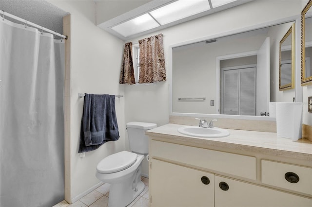 7708 Fairlawn Dr, Hudson, FL 34667 - bathroom featuring toilet, vanity, tile patterned flooring, and a shower with shower curtain