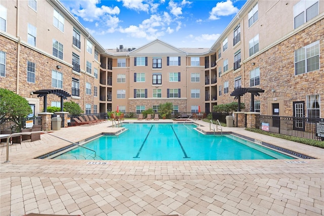 4221 W Spruce St Unit 1429, Tampa, FL 33607 - community pool with a patio area