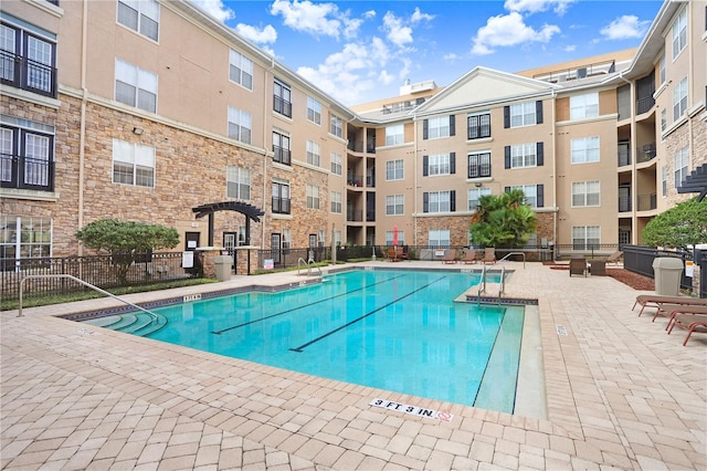 4221 W Spruce St Unit 1429, Tampa, FL 33607 - community pool with a patio area