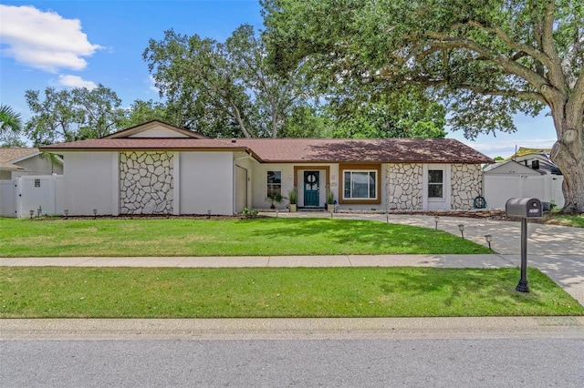 2824 Paddock Dr, Palm Harbor, FL 34684 - single story home featuring stone siding and stucco siding