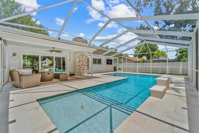 2824 Paddock Dr, Palm Harbor, FL 34684 - view of swimming pool featuring a patio, a ceiling fan, outdoor lounge area, and a lanai