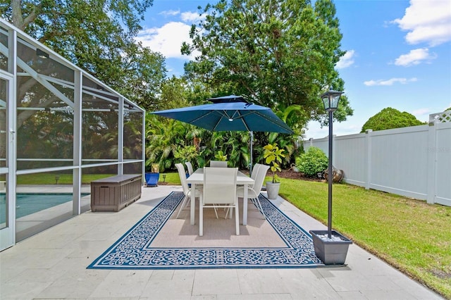 2824 Paddock Dr, Palm Harbor, FL 34684 - view of patio with a lanai and outdoor dining area