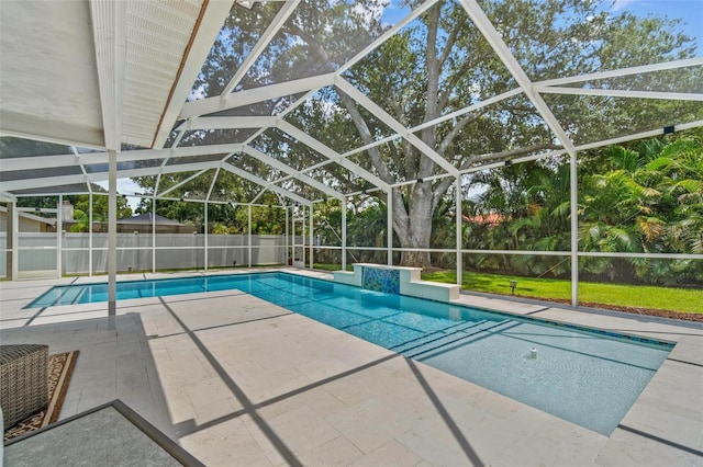 2824 Paddock Dr, Palm Harbor, FL 34684 - view of swimming pool featuring a fenced backyard, a patio area, and a lanai