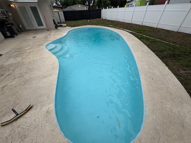 1215 Windsor Cir, Brandon, FL 33510 - view of pool with a patio area and a fenced backyard