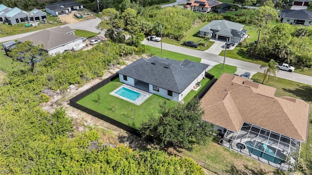 14009 Wenzel Ave, Port Charlotte, FL 33981 - aerial perspective of suburban area featuring a pool