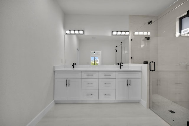 14009 Wenzel Ave, Port Charlotte, FL 33981 - full bath featuring a stall shower, double vanity, and baseboards