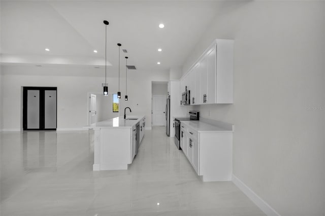 14009 Wenzel Ave, Port Charlotte, FL 33981 - kitchen featuring appliances with stainless steel finishes, a sink, light countertops, white cabinetry, and baseboards