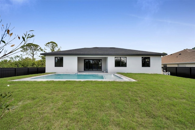 14009 Wenzel Ave, Port Charlotte, FL 33981 - rear view of property with stucco siding