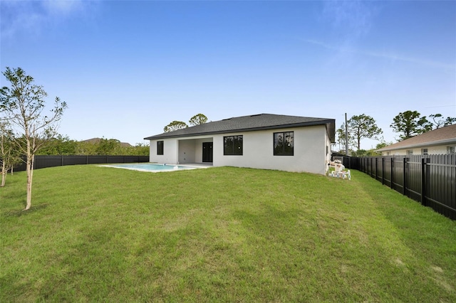 14009 Wenzel Ave, Port Charlotte, FL 33981 - rear view of house with stucco siding