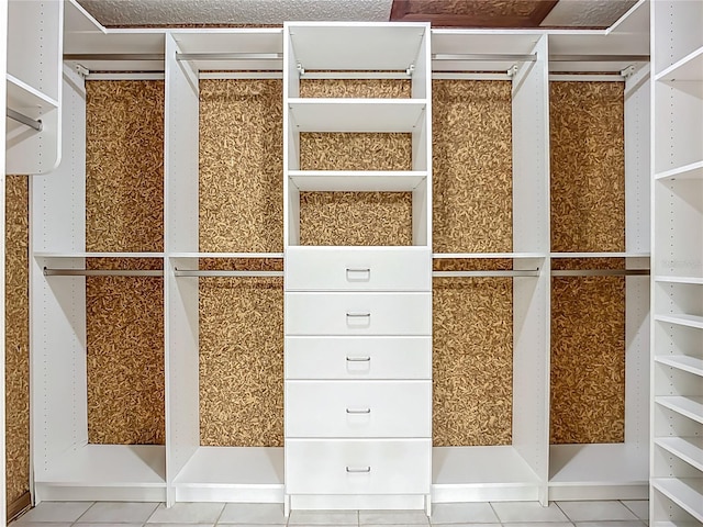 8822 Misty Creek Dr, Sarasota, FL 34241 - spacious closet featuring tile patterned floors