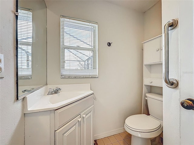 8822 Misty Creek Dr, Sarasota, FL 34241 - half bathroom featuring tile patterned flooring, plenty of natural light, and vanity