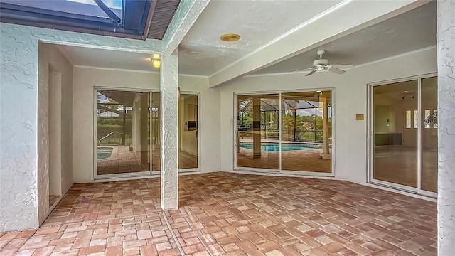 8822 Misty Creek Dr, Sarasota, FL 34241 - unfurnished sunroom with a ceiling fan and healthy amount of natural light