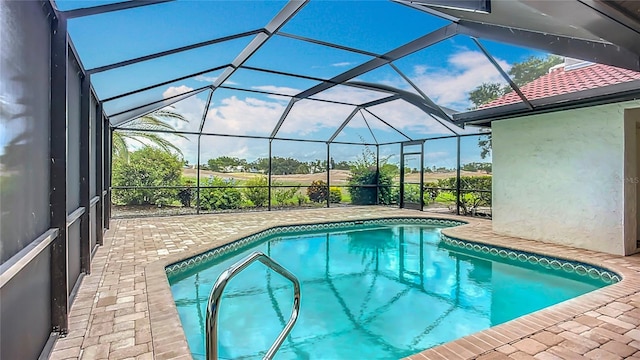 8822 Misty Creek Dr, Sarasota, FL 34241 - outdoor pool featuring a patio area and glass enclosure