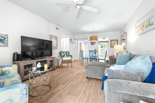 2060 Marilyn St Unit 114, Clearwater, FL 33765 - living area featuring light wood-type flooring and a ceiling fan