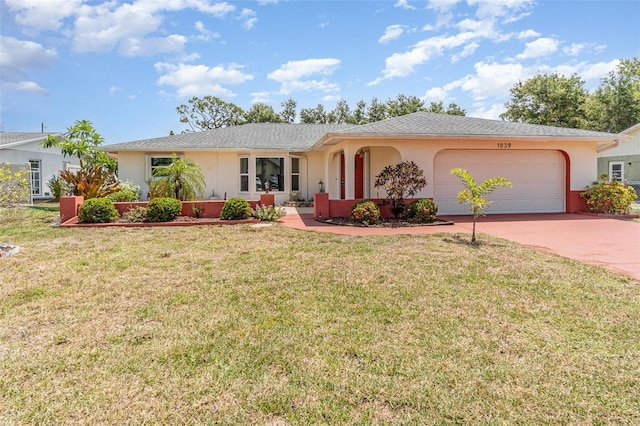 1839 Neptune Dr, Englewood, FL 34223 - ranch-style house featuring stucco siding, an attached garage, driveway, and a front yard