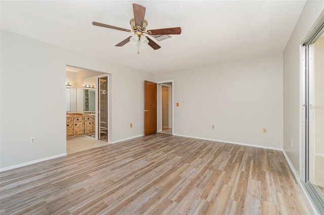 1839 Neptune Dr, Englewood, FL 34223 - spare room with ceiling fan, light wood-type flooring, and baseboards