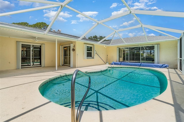 1839 Neptune Dr, Englewood, FL 34223 - view of pool featuring a covered pool, a patio, and glass enclosure