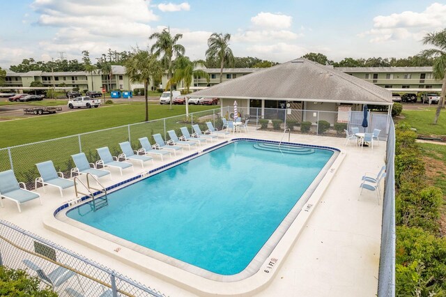 210 Martha Ln Unit 210, Oldsmar, FL 34677 - community pool featuring a patio area
