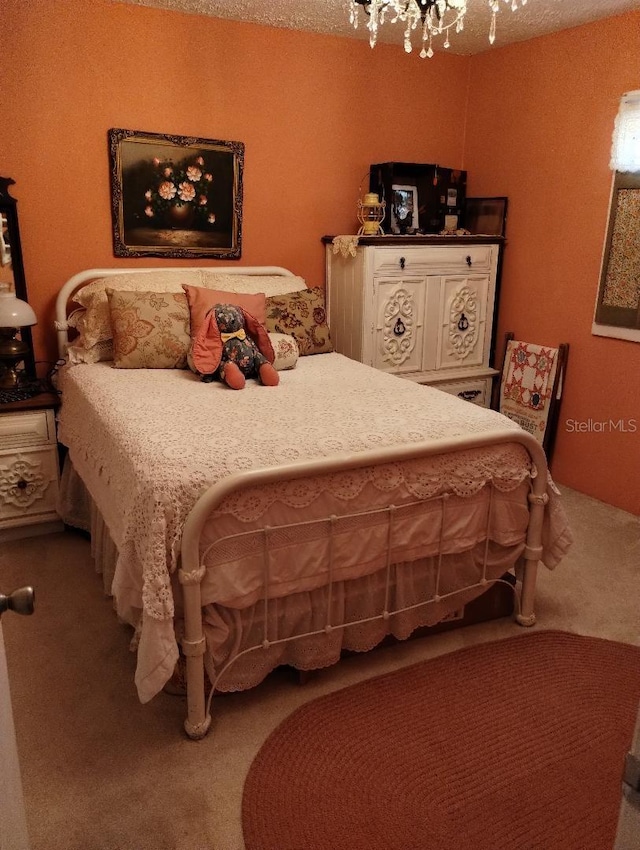 7608 Chenkin, Zephyrhills, FL 33540 - bedroom with carpet flooring and a chandelier