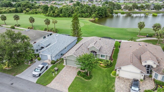 10232 Buncombe Way, San Antonio, FL 33576 - aerial perspective of suburban area featuring a large body of water and a golf club