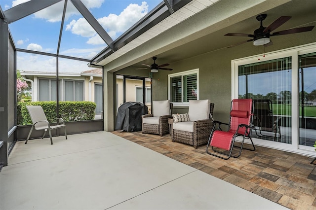 10232 Buncombe Way, San Antonio, FL 33576 - view of patio / terrace with a ceiling fan, grilling area, and glass enclosure