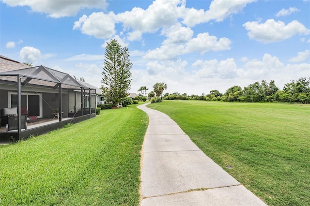10232 Buncombe Way, San Antonio, FL 33576 - view of green lawn with glass enclosure