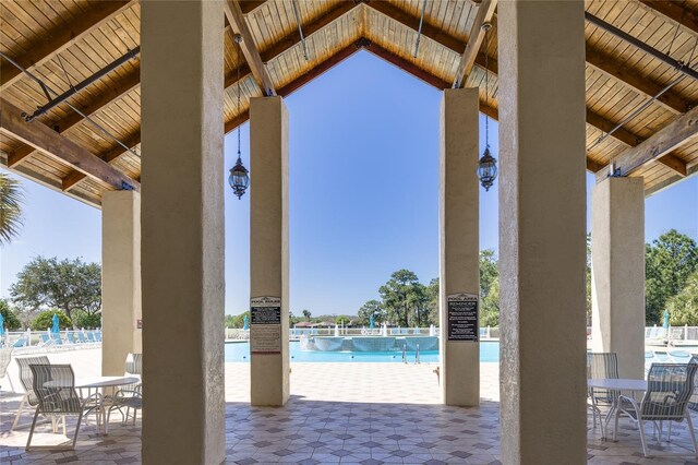 10232 Buncombe Way, San Antonio, FL 33576 - view of patio with a community pool