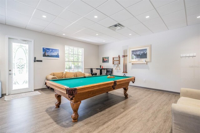 10232 Buncombe Way, San Antonio, FL 33576 - rec room featuring light wood finished floors, billiards table, a paneled ceiling, baseboards, and recessed lighting