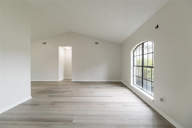 1209 Sugar Creek Ln, Rockledge, FL 32955 - bonus room with lofted ceiling, light wood-style flooring, and baseboards