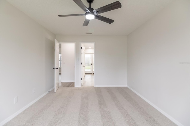 1209 Sugar Creek Ln, Rockledge, FL 32955 - carpeted spare room featuring ceiling fan and baseboards
