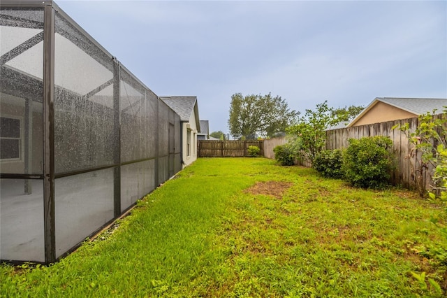 1209 Sugar Creek Ln, Rockledge, FL 32955 - view of yard with glass enclosure