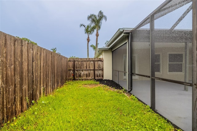 1209 Sugar Creek Ln, Rockledge, FL 32955 - view of yard with a patio area and a lanai