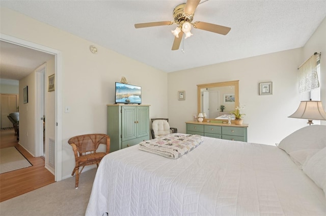 7304 W Country Club Dr N Unit 113, Sarasota, FL 34243 - bedroom featuring carpet flooring and a ceiling fan