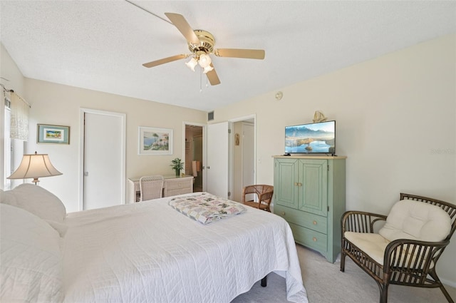 7304 W Country Club Dr N Unit 113, Sarasota, FL 34243 - bedroom featuring light colored carpet and a ceiling fan