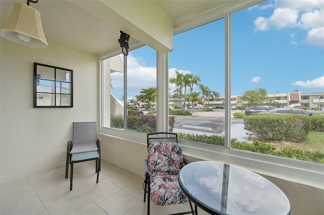7304 W Country Club Dr N Unit 113, Sarasota, FL 34243 - sunroom with tile patterned flooring