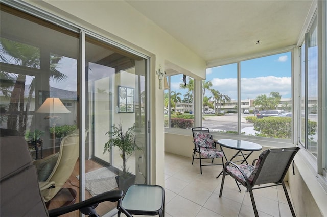 7304 W Country Club Dr N Unit 113, Sarasota, FL 34243 - sunroom with a residential view