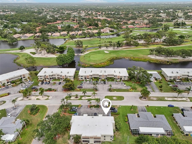 7304 W Country Club Dr N Unit 113, Sarasota, FL 34243 - aerial view of property's location with a golf course, a large body of water, and nearby suburban area