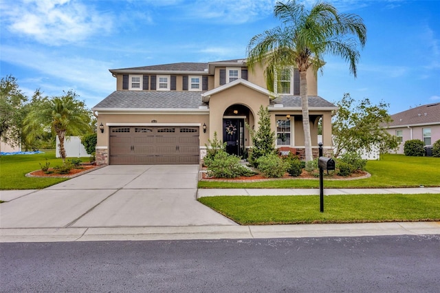5624 Fisher Glen Loop, Wesley Chapel, FL 33545 - view of front of house featuring stucco siding, a front yard, driveway, an attached garage, and stone siding
