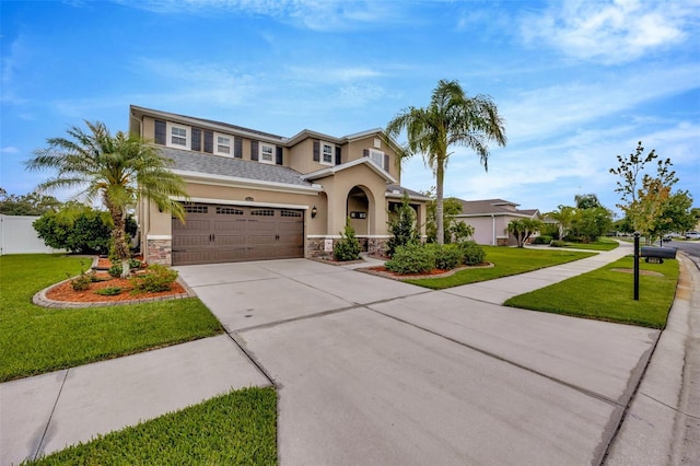 5624 Fisher Glen Loop, Wesley Chapel, FL 33545 - view of front facade with stucco siding, stone siding, and concrete driveway