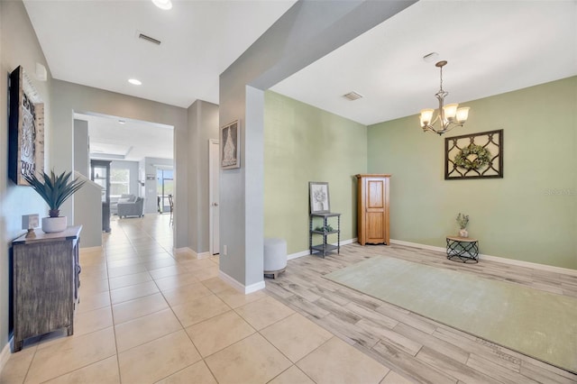 5624 Fisher Glen Loop, Wesley Chapel, FL 33545 - entryway featuring a chandelier, light wood-style floors, baseboards, and recessed lighting