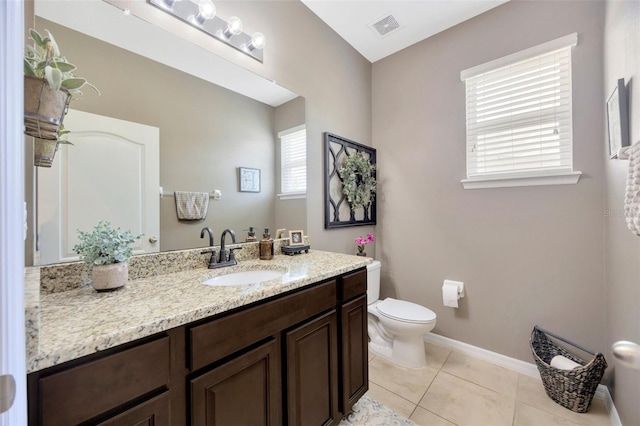 5624 Fisher Glen Loop, Wesley Chapel, FL 33545 - bathroom featuring toilet, vanity, tile patterned floors, and baseboards