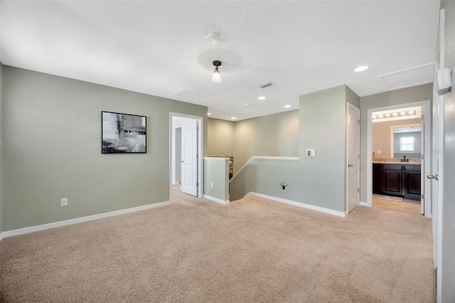 5624 Fisher Glen Loop, Wesley Chapel, FL 33545 - unfurnished room with light colored carpet, baseboards, and recessed lighting