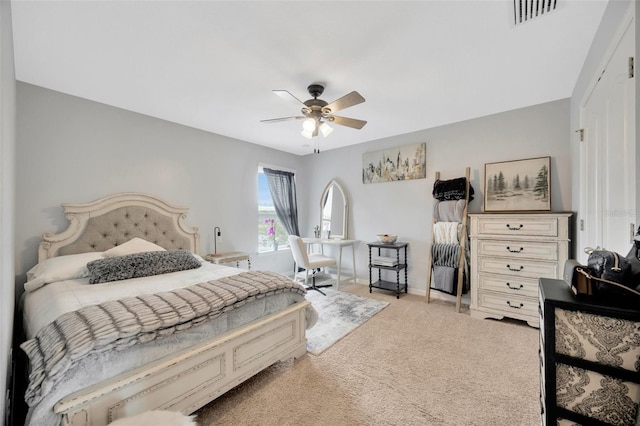 5624 Fisher Glen Loop, Wesley Chapel, FL 33545 - bedroom with light carpet, baseboards, and a ceiling fan