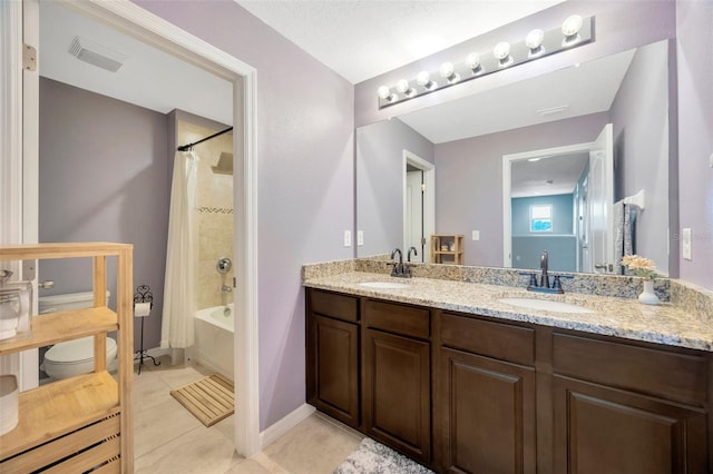 5624 Fisher Glen Loop, Wesley Chapel, FL 33545 - bathroom with toilet, double vanity, tile patterned flooring, and shower / bathtub combination with curtain