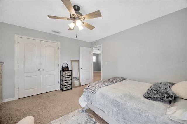 5624 Fisher Glen Loop, Wesley Chapel, FL 33545 - carpeted bedroom with a closet, a ceiling fan, and baseboards