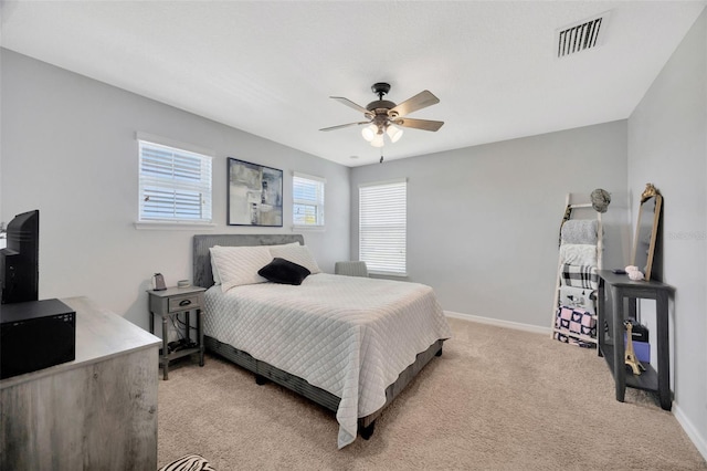 5624 Fisher Glen Loop, Wesley Chapel, FL 33545 - bedroom with light colored carpet, baseboards, and ceiling fan